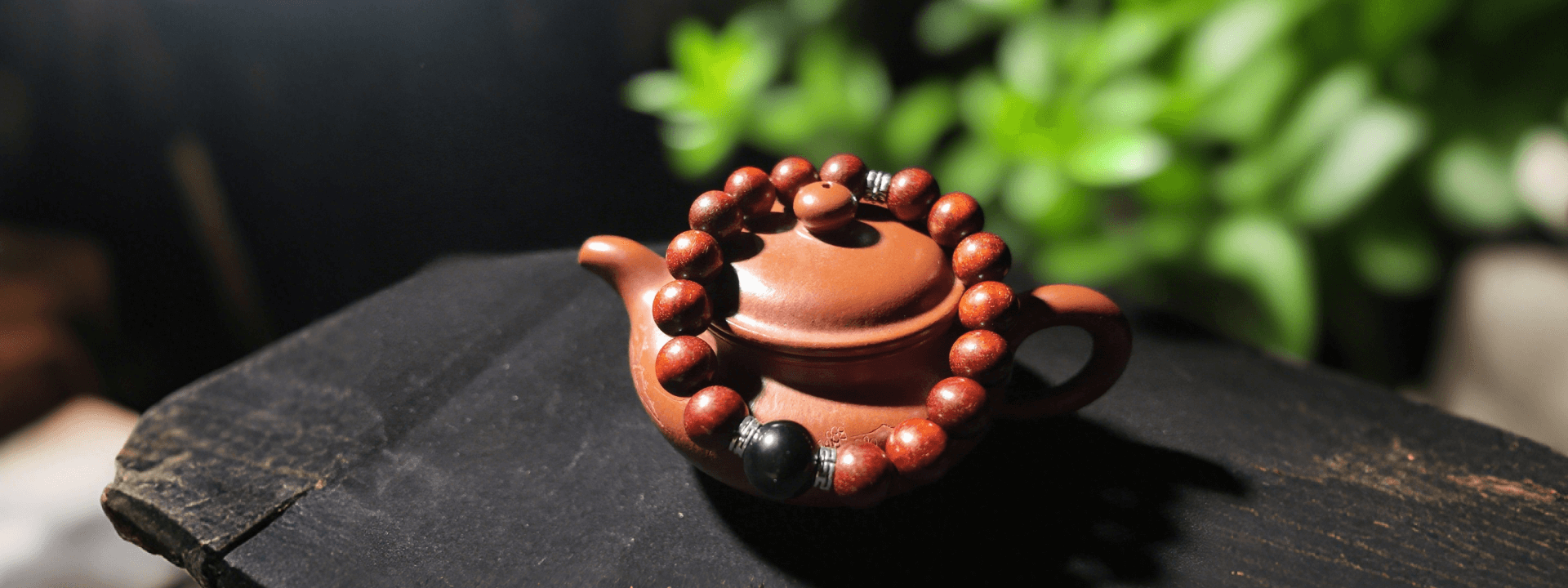 Crimson Obsidian Guardian Bracelet made of sandalwood and black obsidian