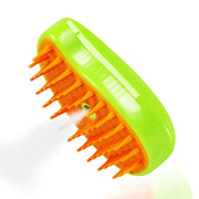 Front view of green rechargeable mist brush for cats & dogs with orange silicone pins