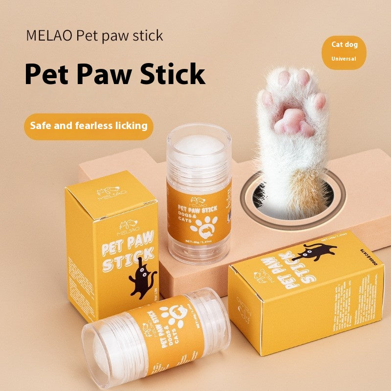 Twist-up pet paw balm stick with boxed packaging on neutral background