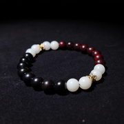 Sacred Tranquility Bracelet with rosewood, ebony, and white bodhi beads