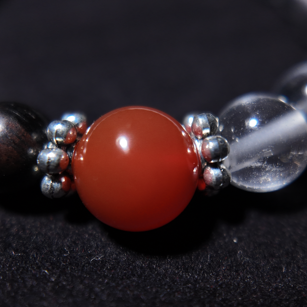 Red agate bead for strength, stability, and spiritual healing