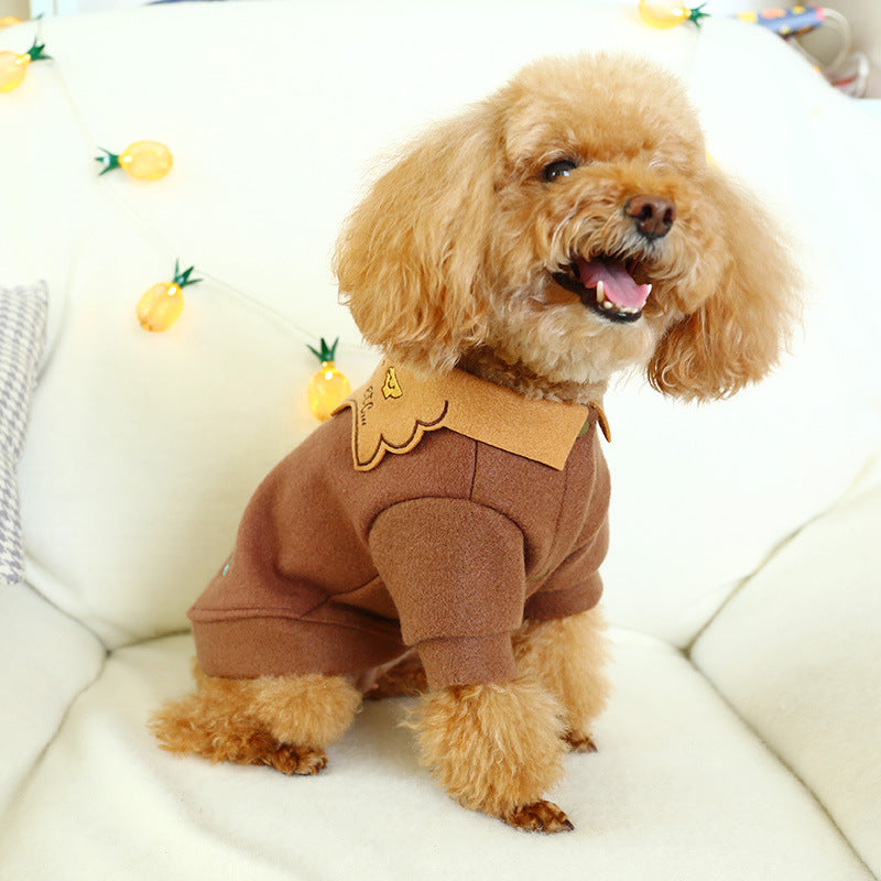 Side and back view showing scallop collar and shoulder tailoring details.