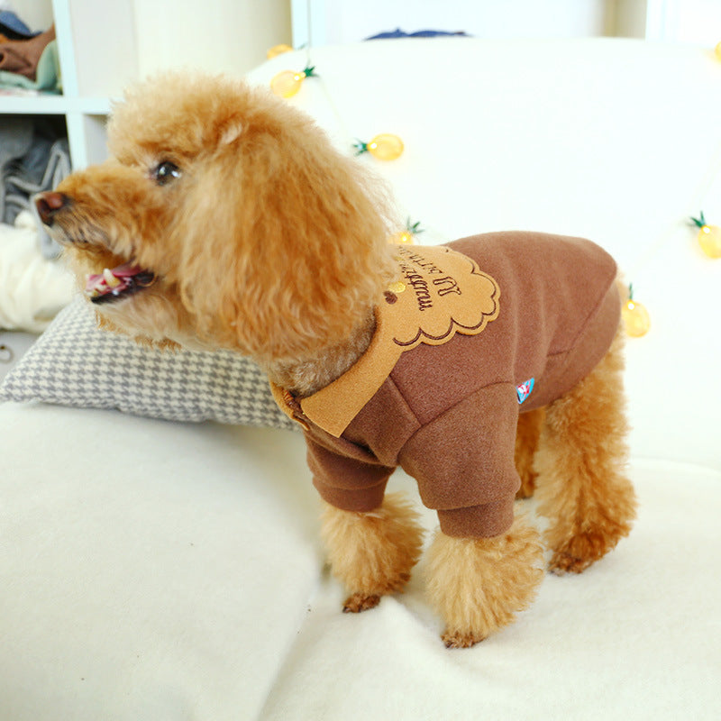 Collar and stitch close-up showing polyester plush texture and craftsmanship.