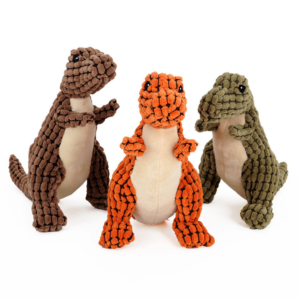 Color lineup of green, brown, and yellow dino plush toys.