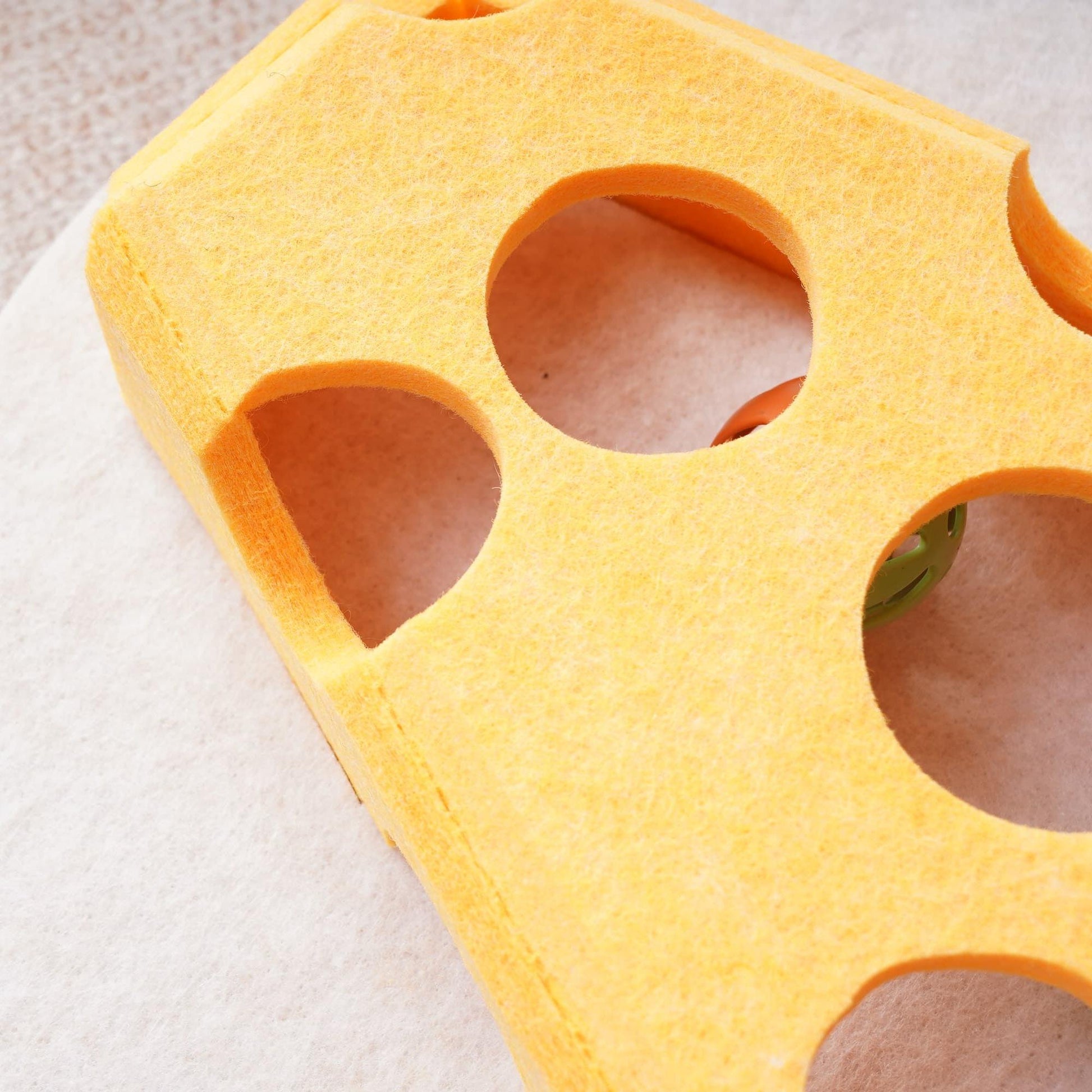 Soft felt material detail—quiet and paw-friendly