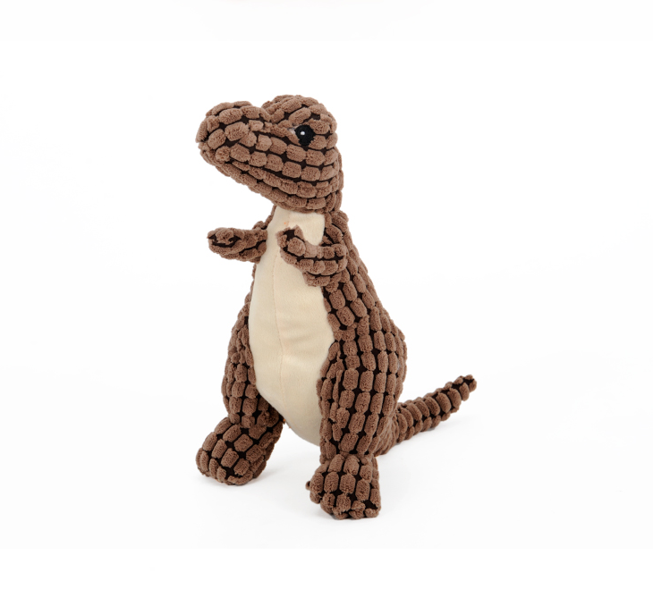 Standing brown dino toy with visible corn-plush texture.